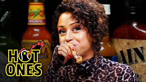 Hot Ones - S10E4: Liza Koshy Meets Her Future Self While Eating Spicy Wings