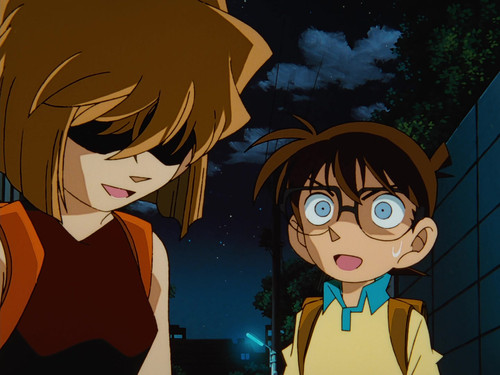 Detective Conan - S1E129: The Girl from the Black Organization and the University Professor Murder Case