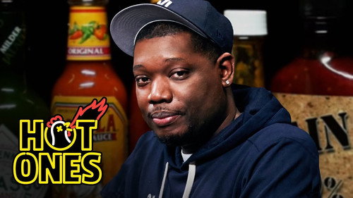 Hot Ones - S15E9: Michael Che Gs Up While Eating Spicy Wings