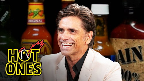 Hot Ones - S21E10: John Stamos Falls Out of His Chair While Eating Spicy Wings